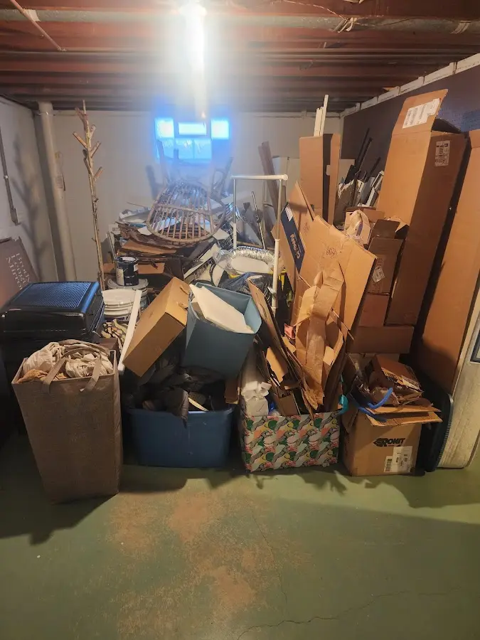 Roll-off dumpster container at job site for 15 Yard Dumpster Rental in Ripley